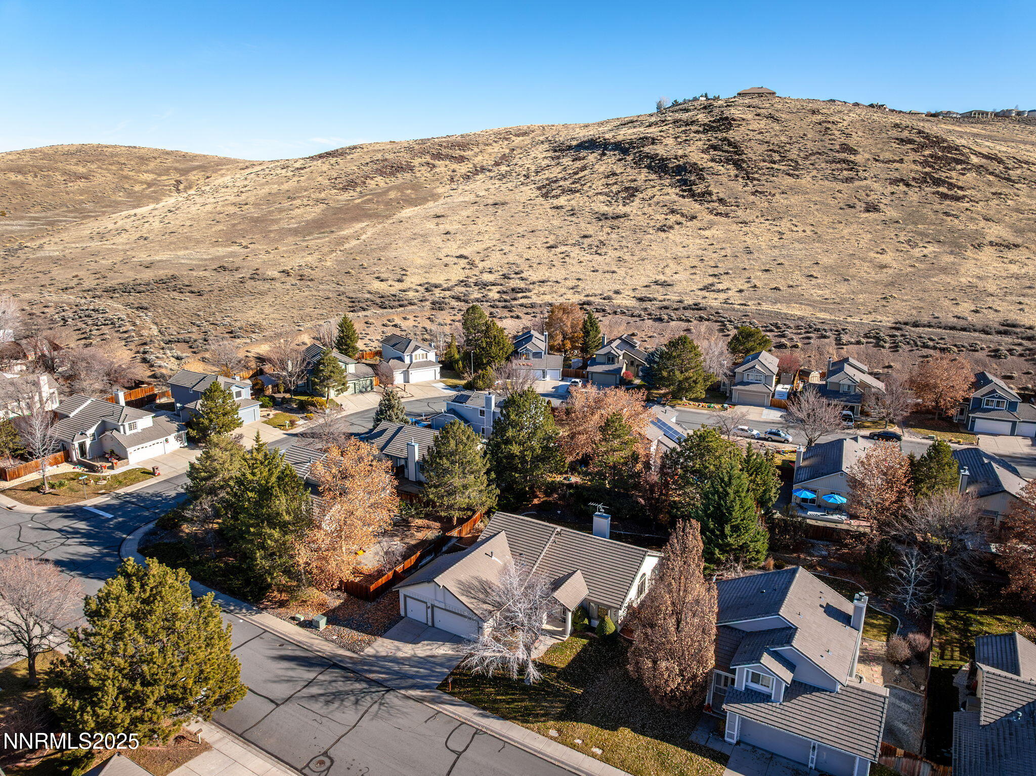 5466 Santa Rosa Avenue Sparks, NV 89436 - Photo 6 of 36 an aerial view of residential houses with outdoor space