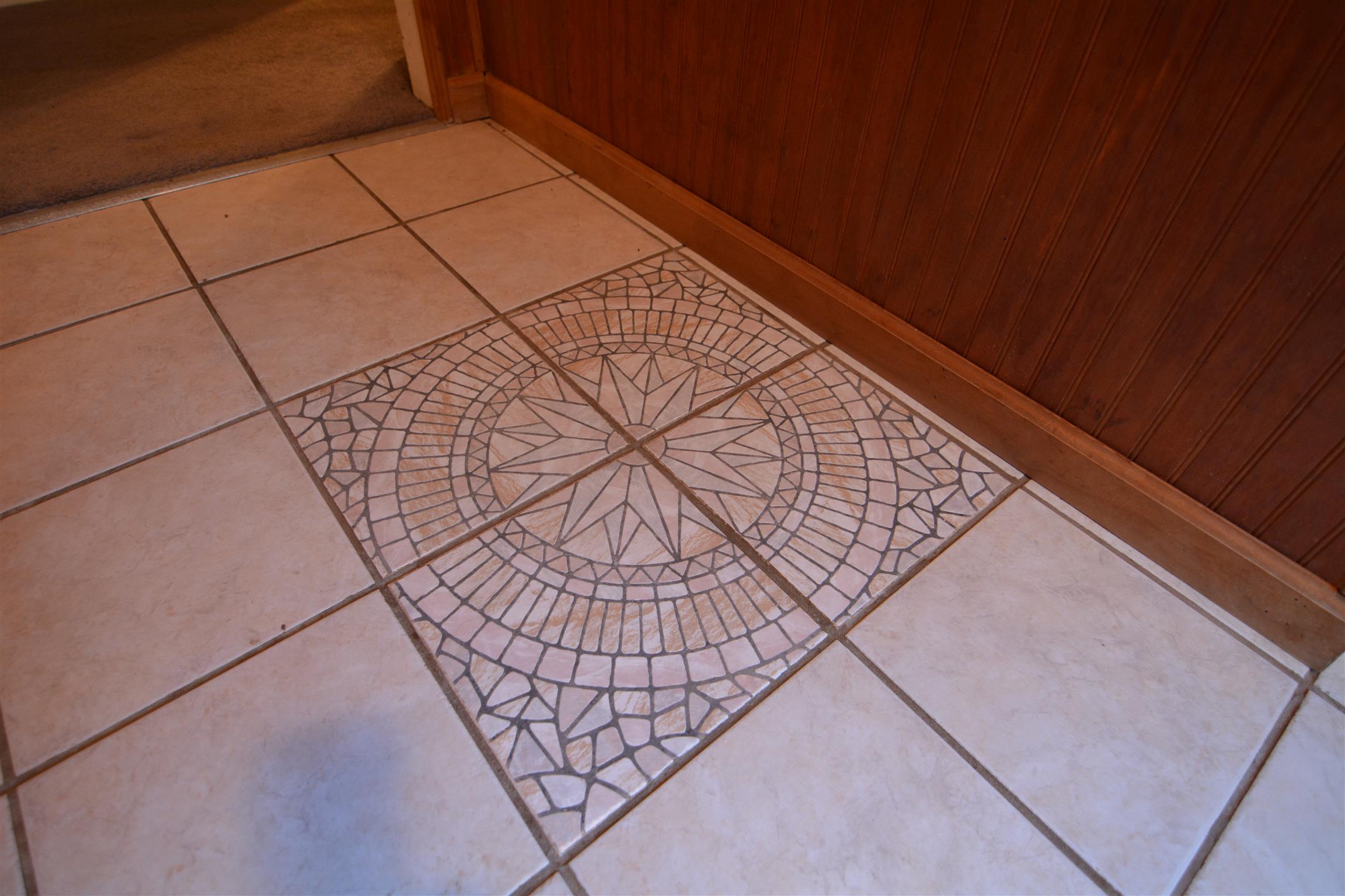 1433 Buckeye Road Fayetteville, TN 37334 - Photo 3 of 15 Neat tile work can be found in the foyer.