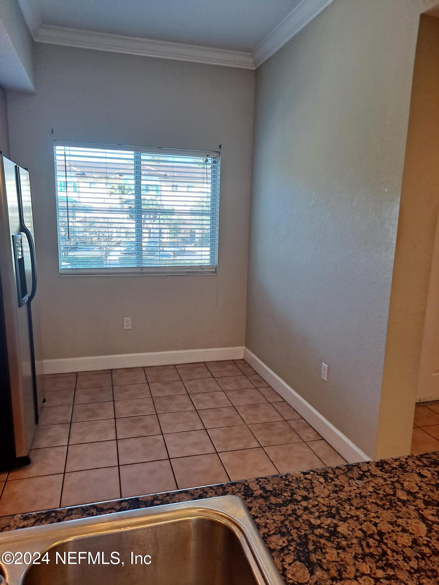 9745 Touchton Road, Unit 927 Jacksonville, FL 32246 - Photo 5 of 22 a view of a room with window