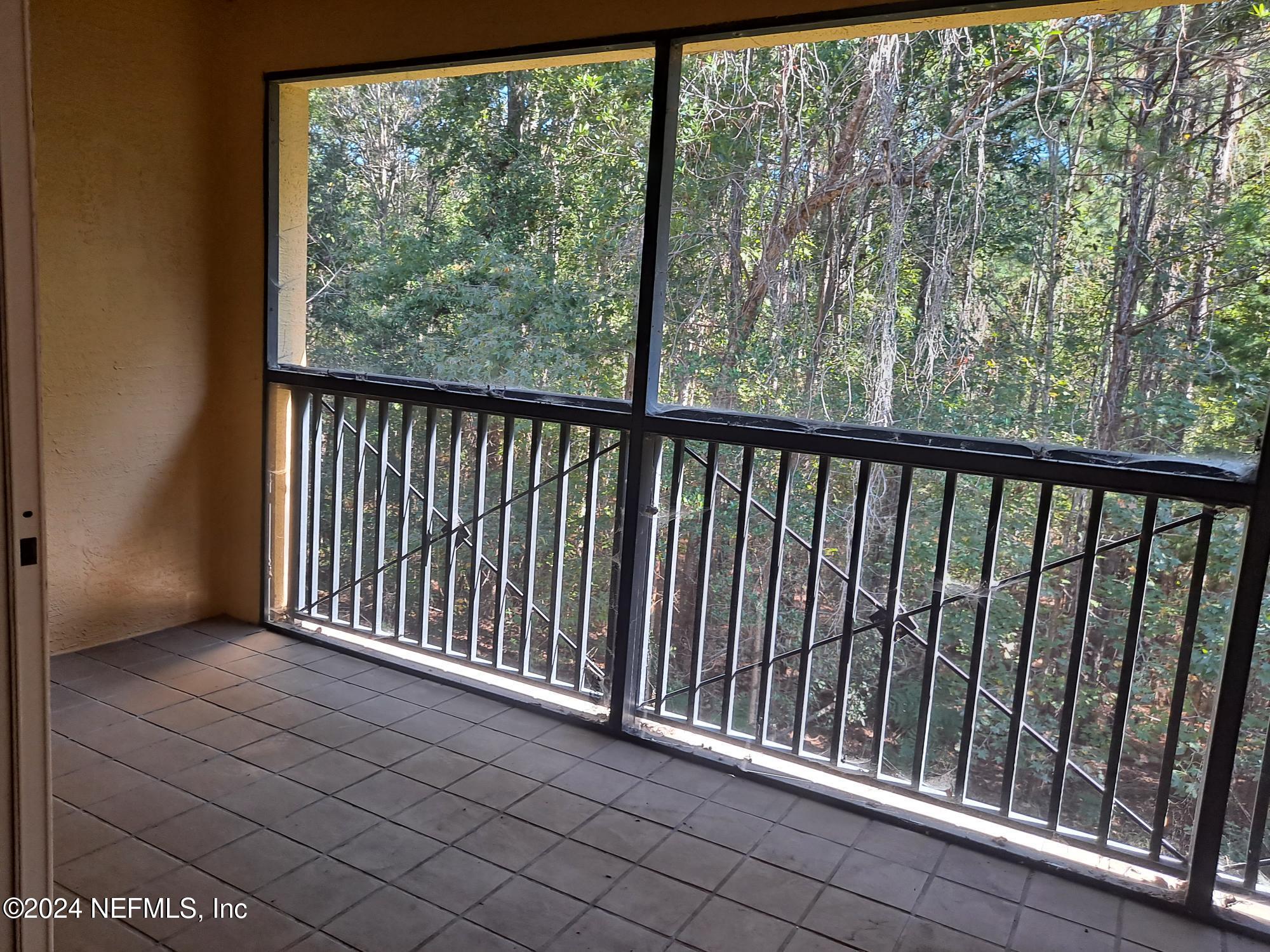 9745 Touchton Road, Unit 927 Jacksonville, FL 32246 - Photo 9 of 22 a view of a balcony