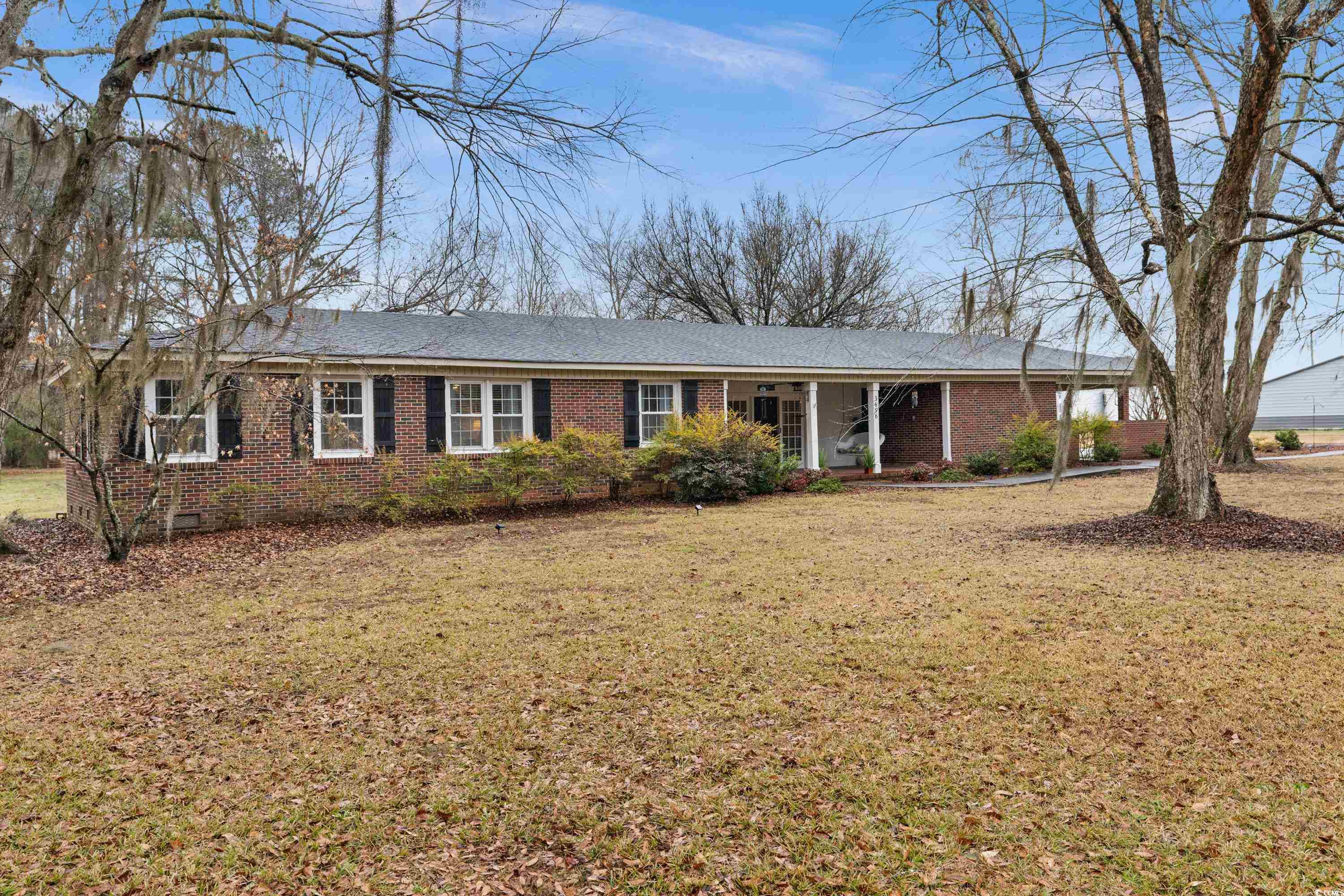 3696 Sandy Bay Road Kingstree, SC 29556 - Photo 3 of 40 Ranch-style house with a front yard