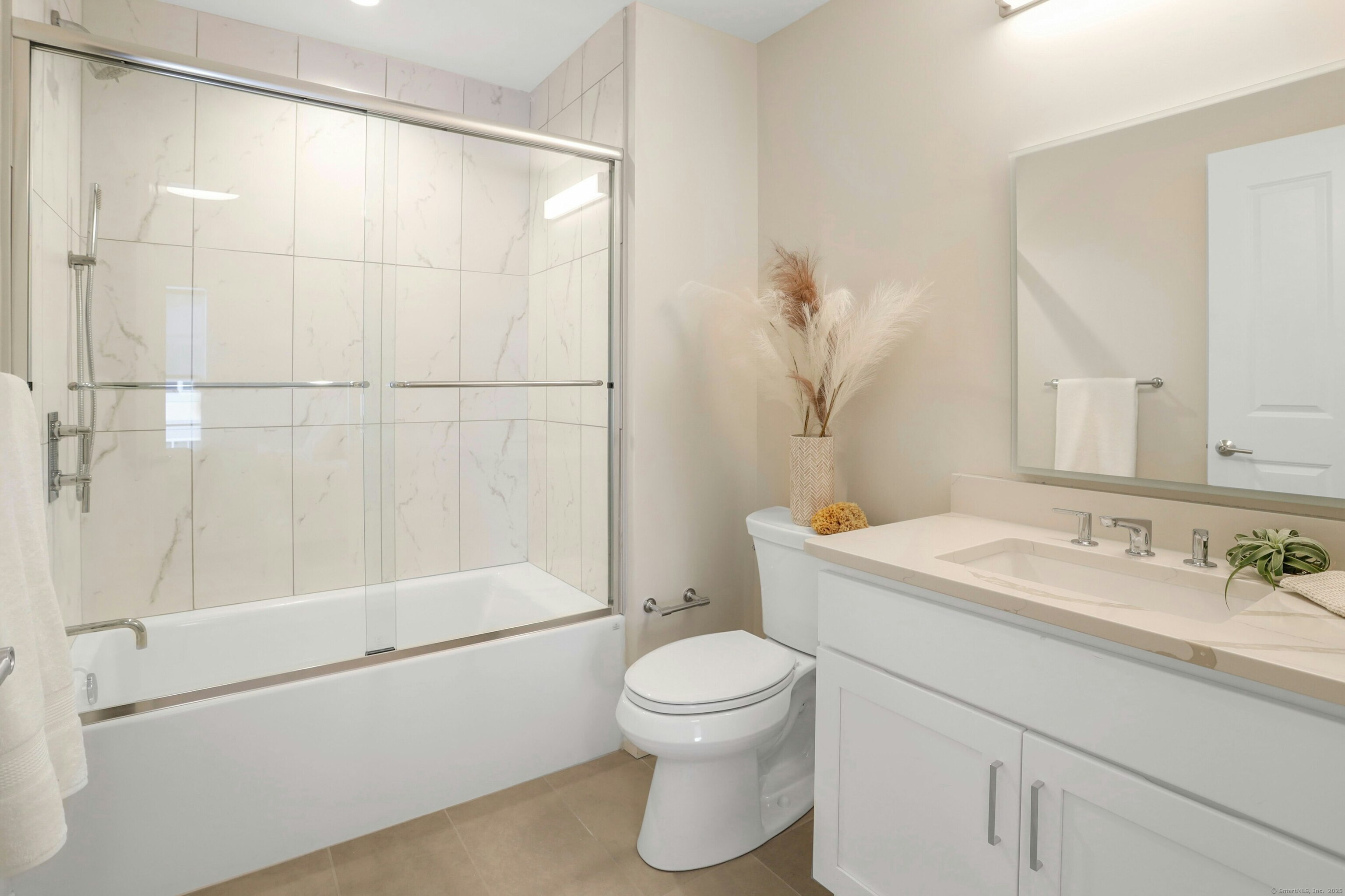 340 Heights Road, Unit 322 Darien, CT 06820 - Photo 8 of 15 a bathroom with a sink toilet and shower