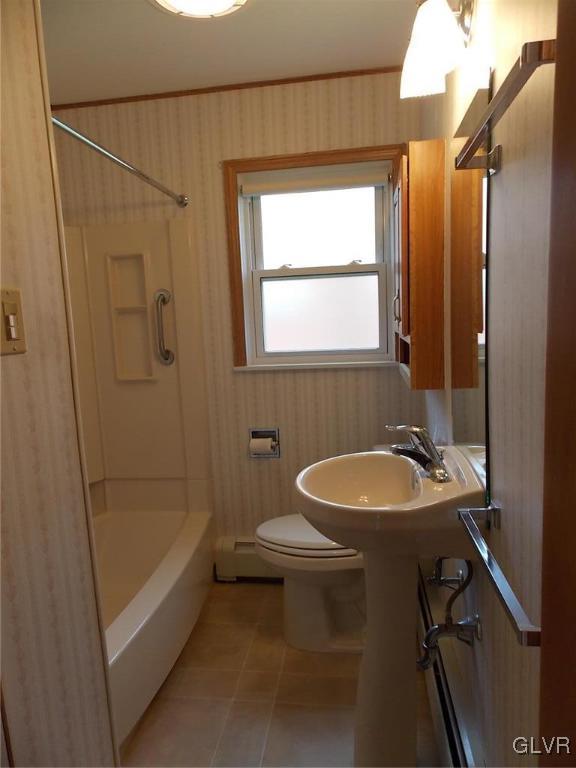 4244 Briarcliff Road Allentown, PA 18104 - Photo 12 of 13 a bathroom with a sink a toilet and shower