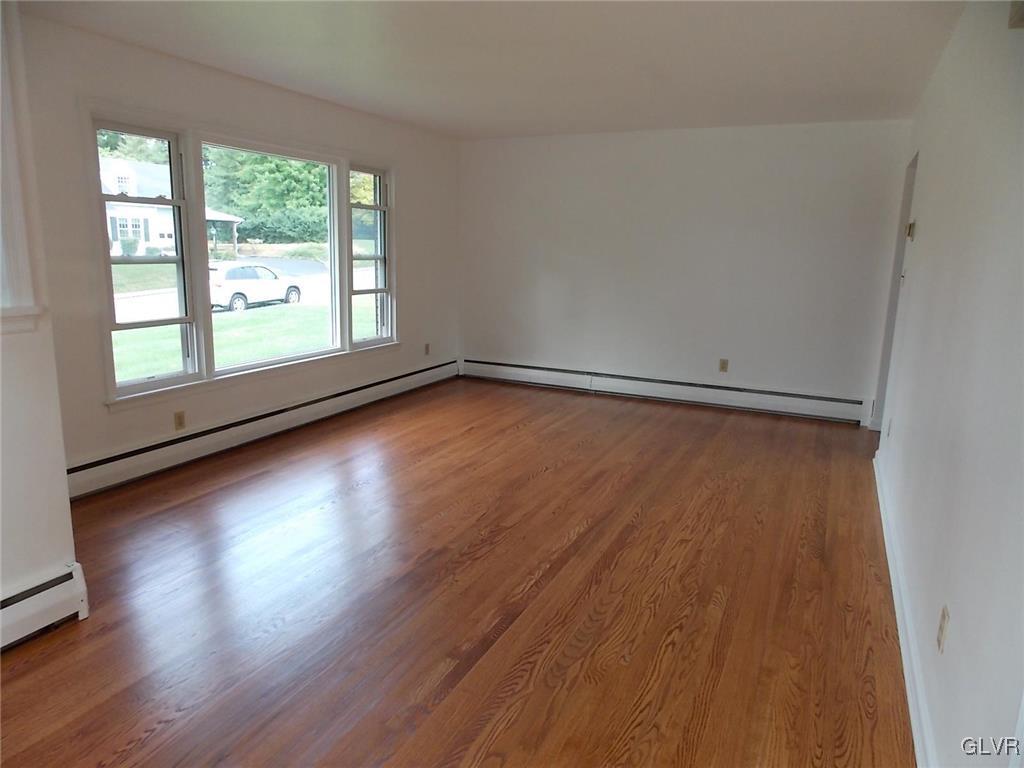 4244 Briarcliff Road Allentown, PA 18104 - Photo 6 of 13 a view of room with window and wooden floor