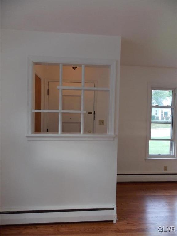 4244 Briarcliff Road Allentown, PA 18104 - Photo 8 of 13 a view of an empty room with wooden floor and a window
