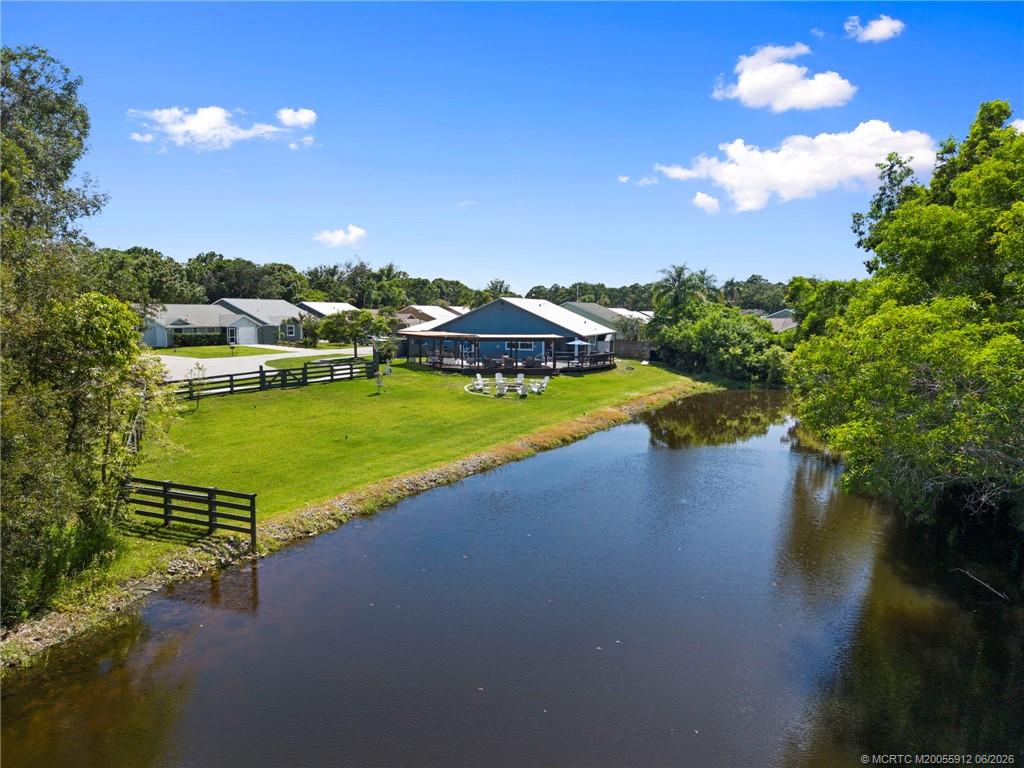 4401 Southeast Satinleaf Place Stuart, FL 34997 - Photo 45 of 51 Ariel of Home, Lake, and Lot