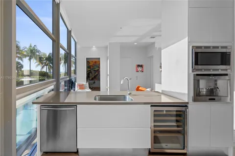 a view of a living room and a large windows