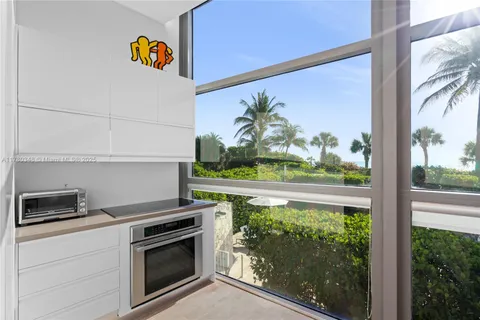 a kitchen with a stove and a microwave