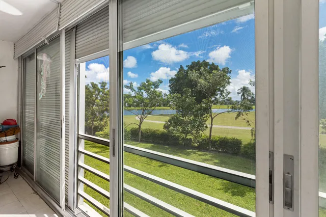 a view of swimming pool from a window