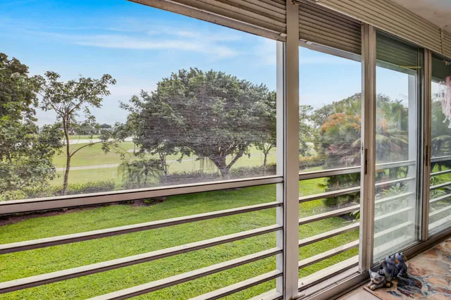 a view of a large room with a large window