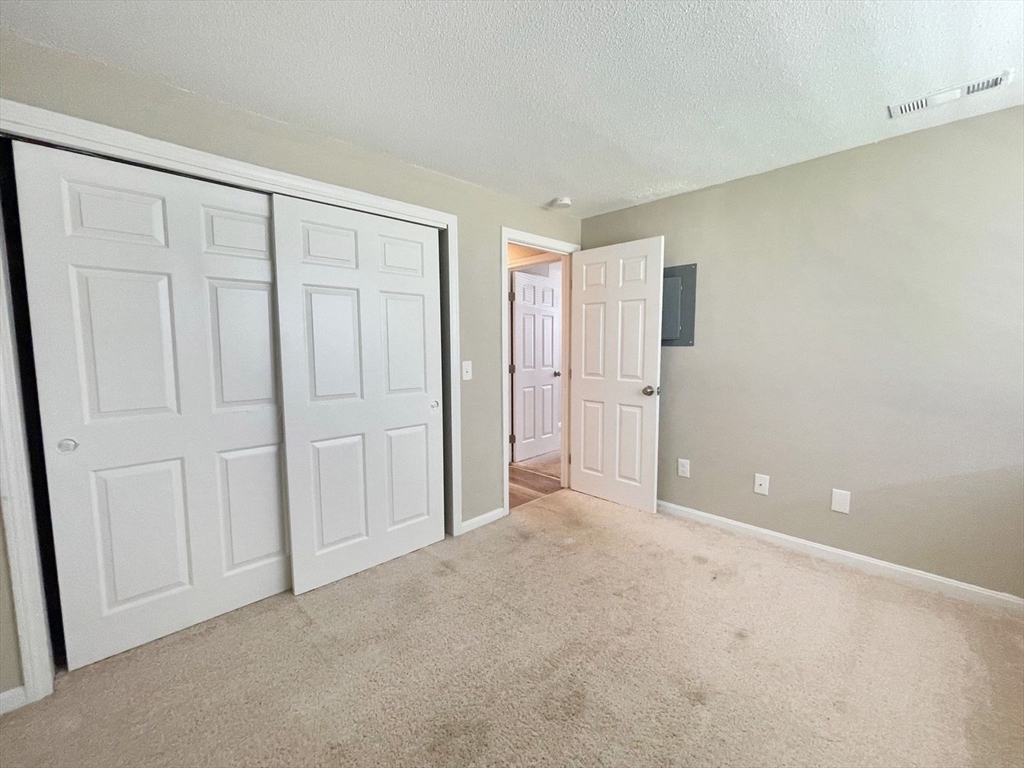 1617 Braley Road, Unit 82 New Bedford, MA 02745 - Photo 9 of 12 a view of an empty room