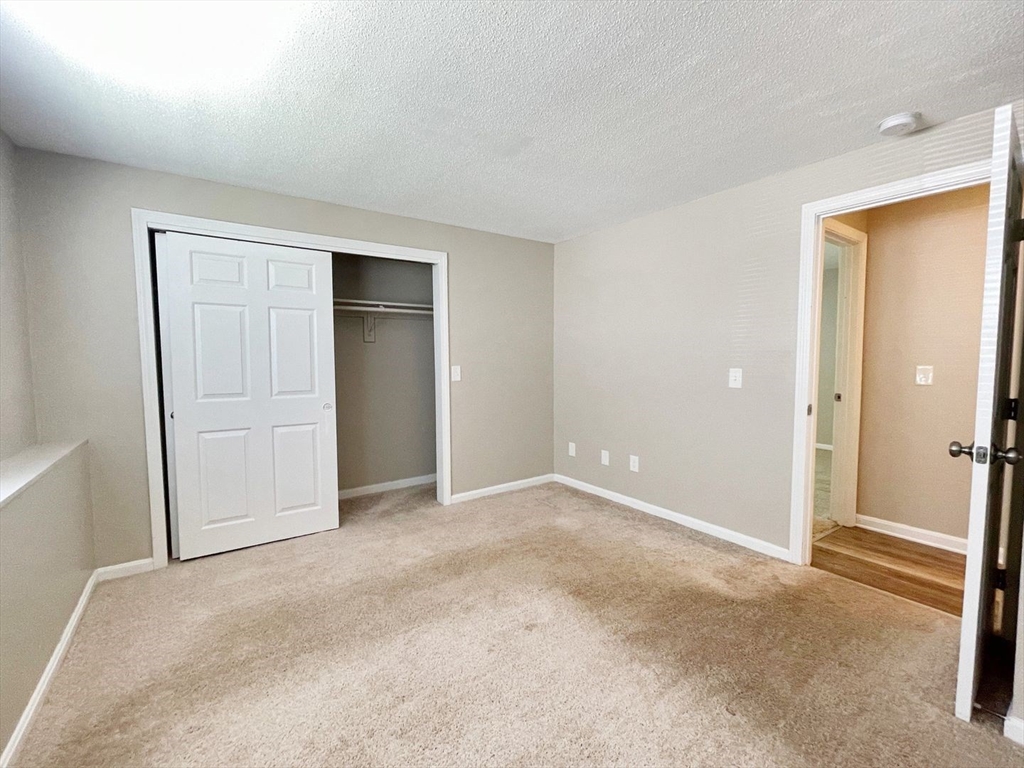 1617 Braley Road, Unit 82 New Bedford, MA 02745 - Photo 10 of 12 a view of an empty room