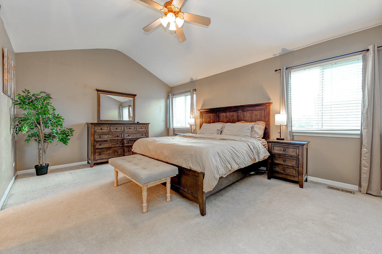 600 Cameron Drive Antioch, IL 60002 - Photo 15 of 23 a bedroom with a bed and a chandelier