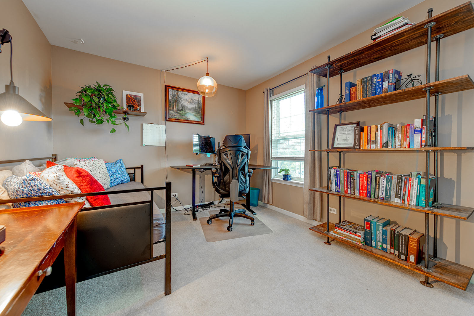 600 Cameron Drive Antioch, IL 60002 - Photo 19 of 23 a view of a workspace with furniture and a book shelf