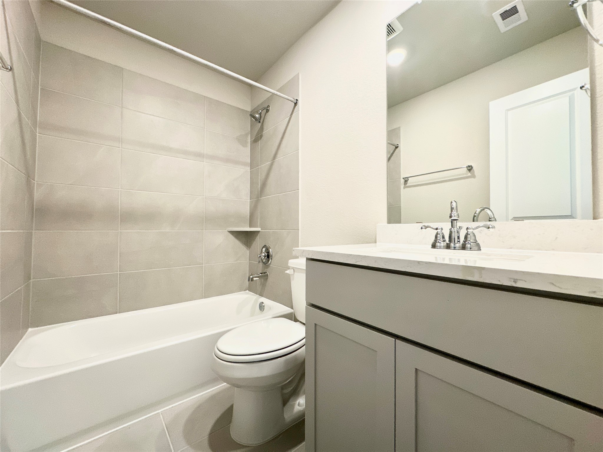 12198 Ridge Top Drive Conroe, TX 77304 - Photo 16 of 27 a bathroom with a sink a toilet and a bathtub
