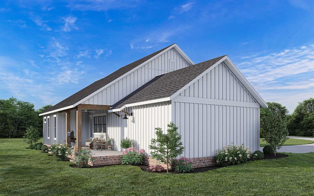 3791 Tbd Chico County Road Paradise, TX 76073 - Photo 19 of 21 a front view of a house with garden