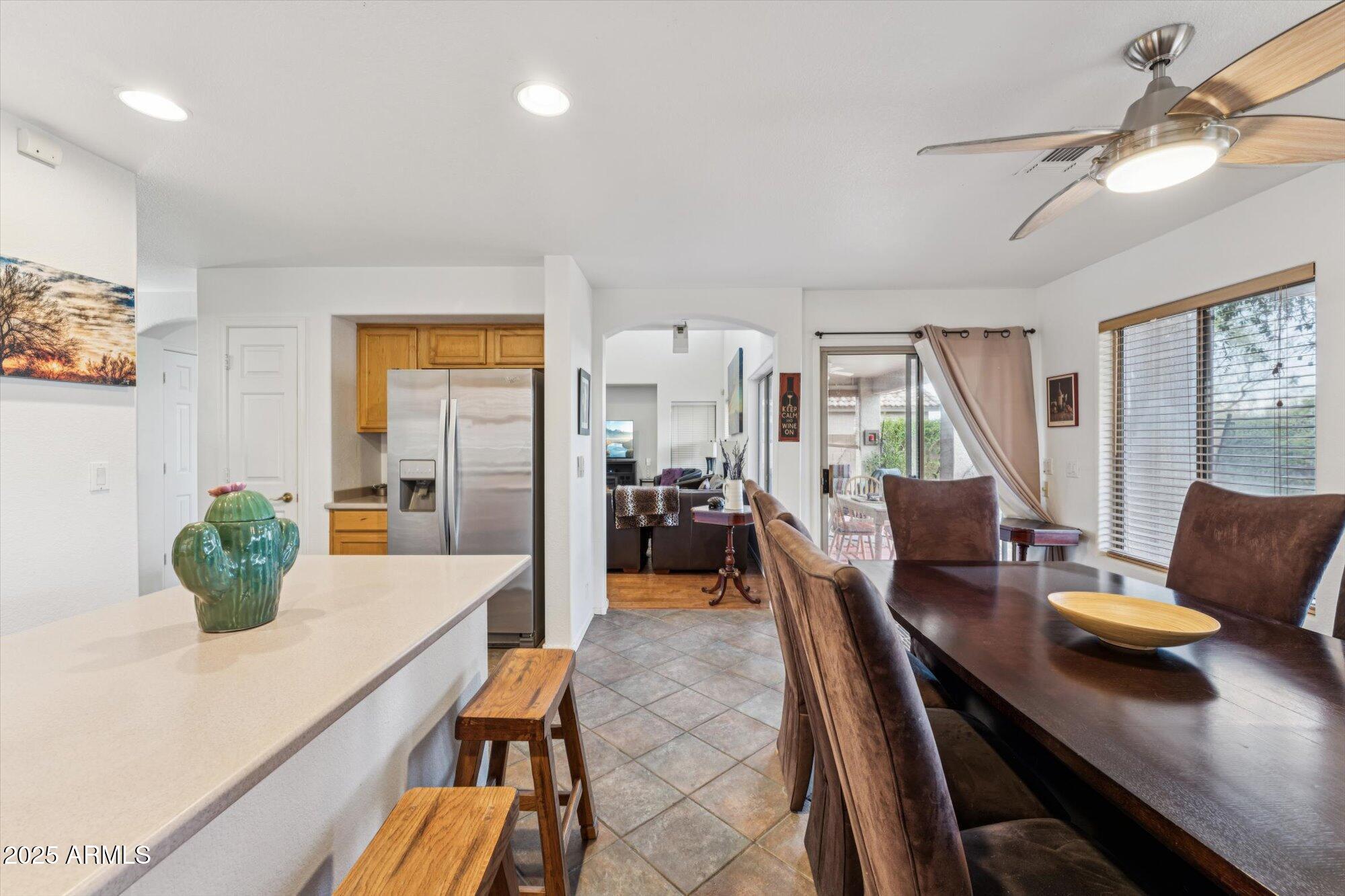 5128 East Via Dona Road Cave Creek, AZ 85331 - Photo 14 of 38 a living room with furniture and a potted plant