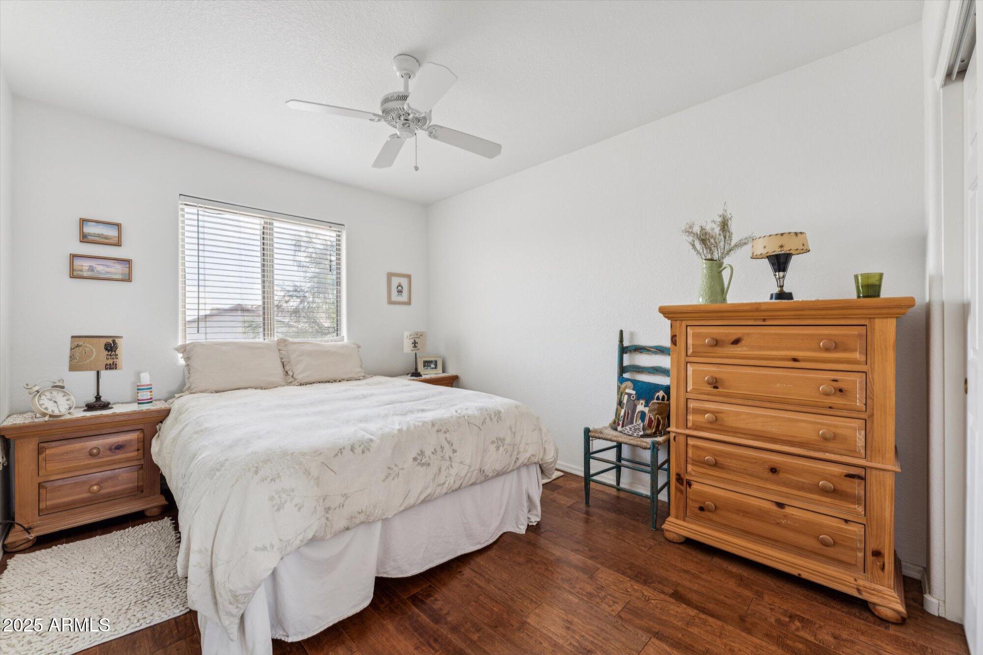 5128 East Via Dona Road Cave Creek, AZ 85331 - Photo 30 of 38 a bedroom with a bed and a dresser