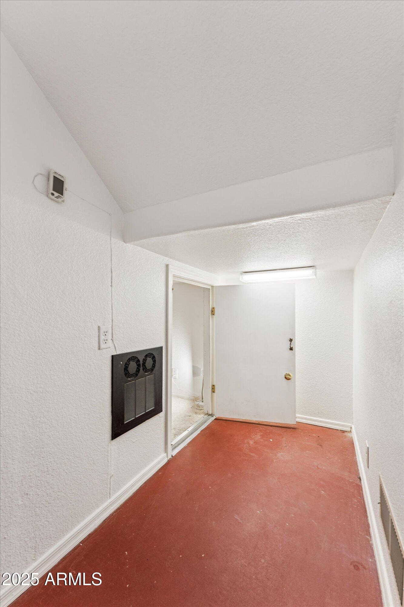 5128 East Via Dona Road Cave Creek, AZ 85331 - Photo 33 of 38 a view of an empty room with a kitchen