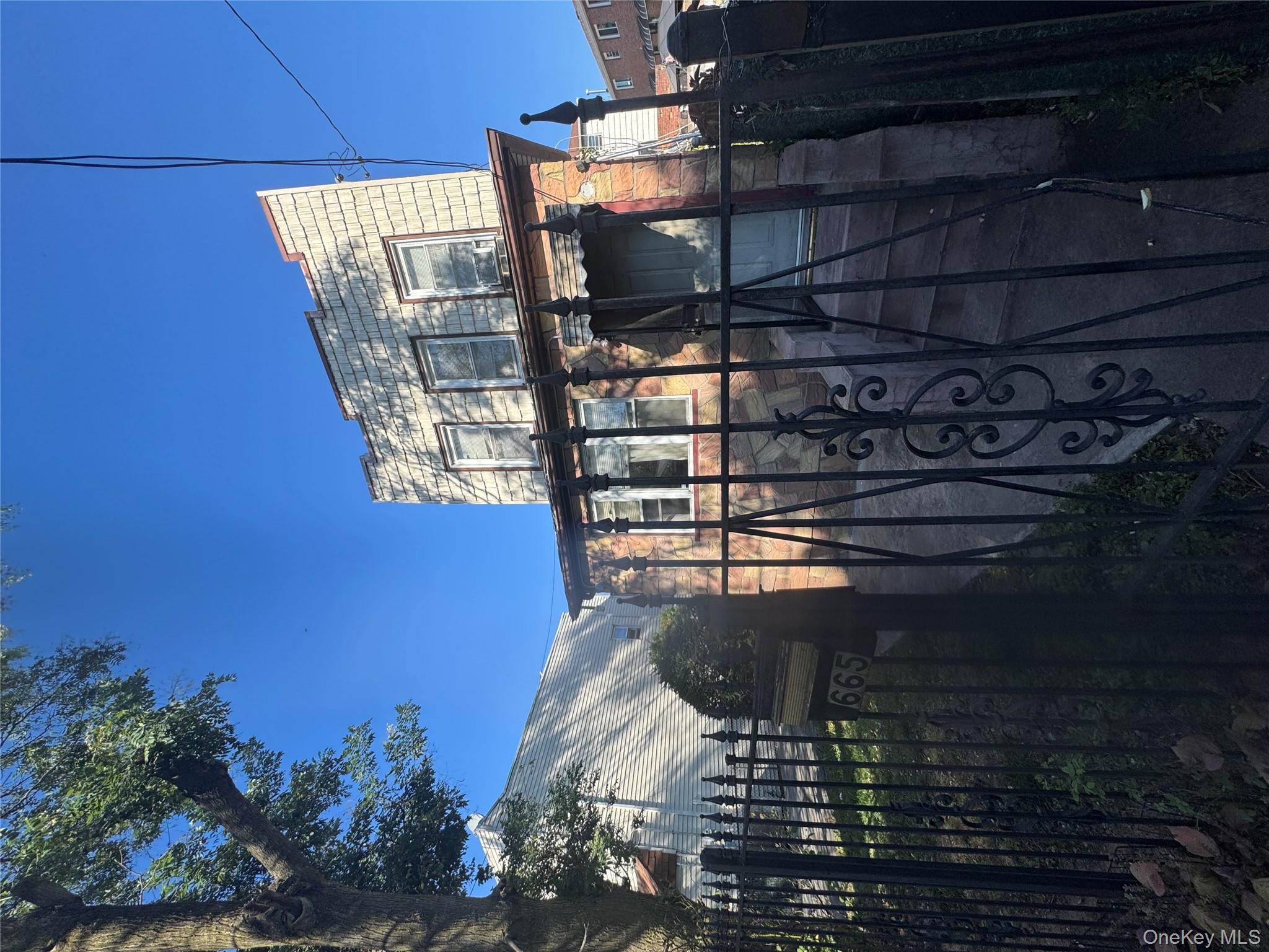 665 Varkens Hook Road Brooklyn, NY 11236 - Photo 2 of 3 a view of a balcony with chairs
