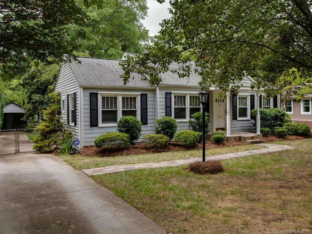 907 Sedgefield Road Charlotte, NC 28209 - Photo 1 of 21 front view of a house with a yard