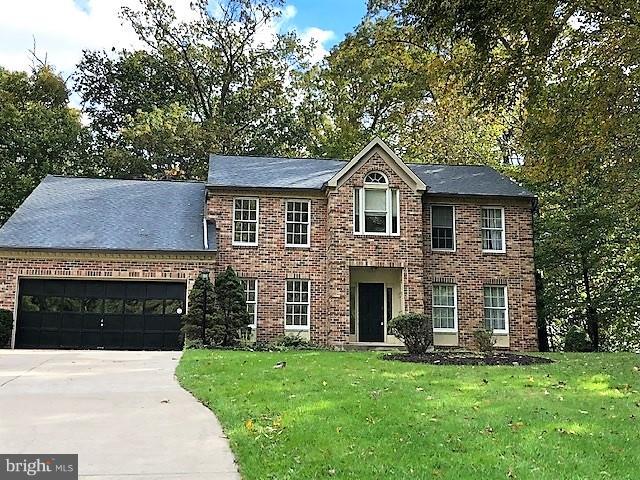 1217 Brookview Road Baltimore, MD 21286 - Photo 1 of 16 a front view of a house with a garden