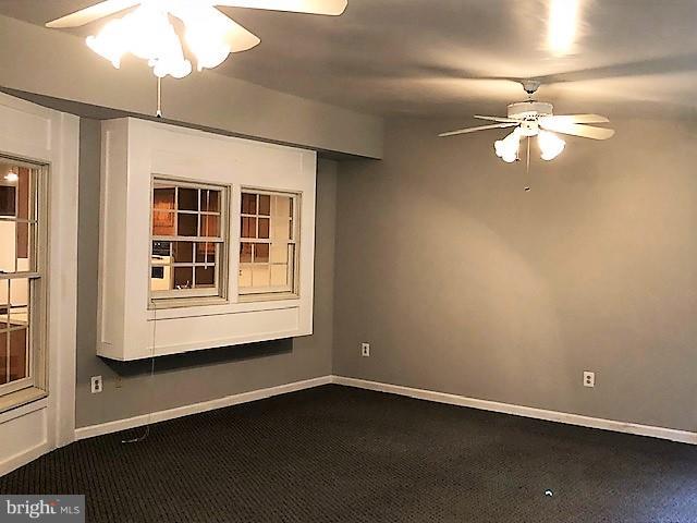 1217 Brookview Road Baltimore, MD 21286 - Photo 10 of 16 a view of an empty room with a window