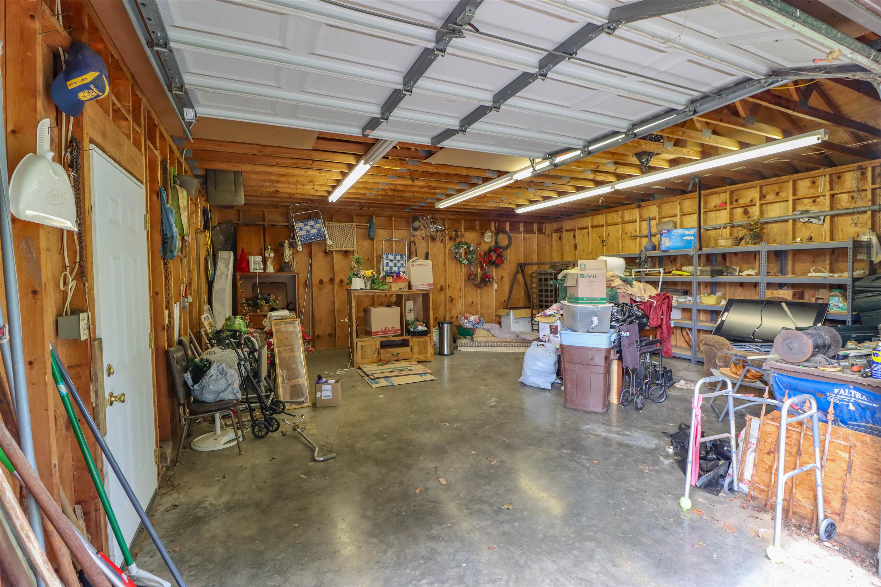 2250 Chisholm Lake Road Ripley, TN 38063 - Photo 24 of 32 a view of a storage room with racks
