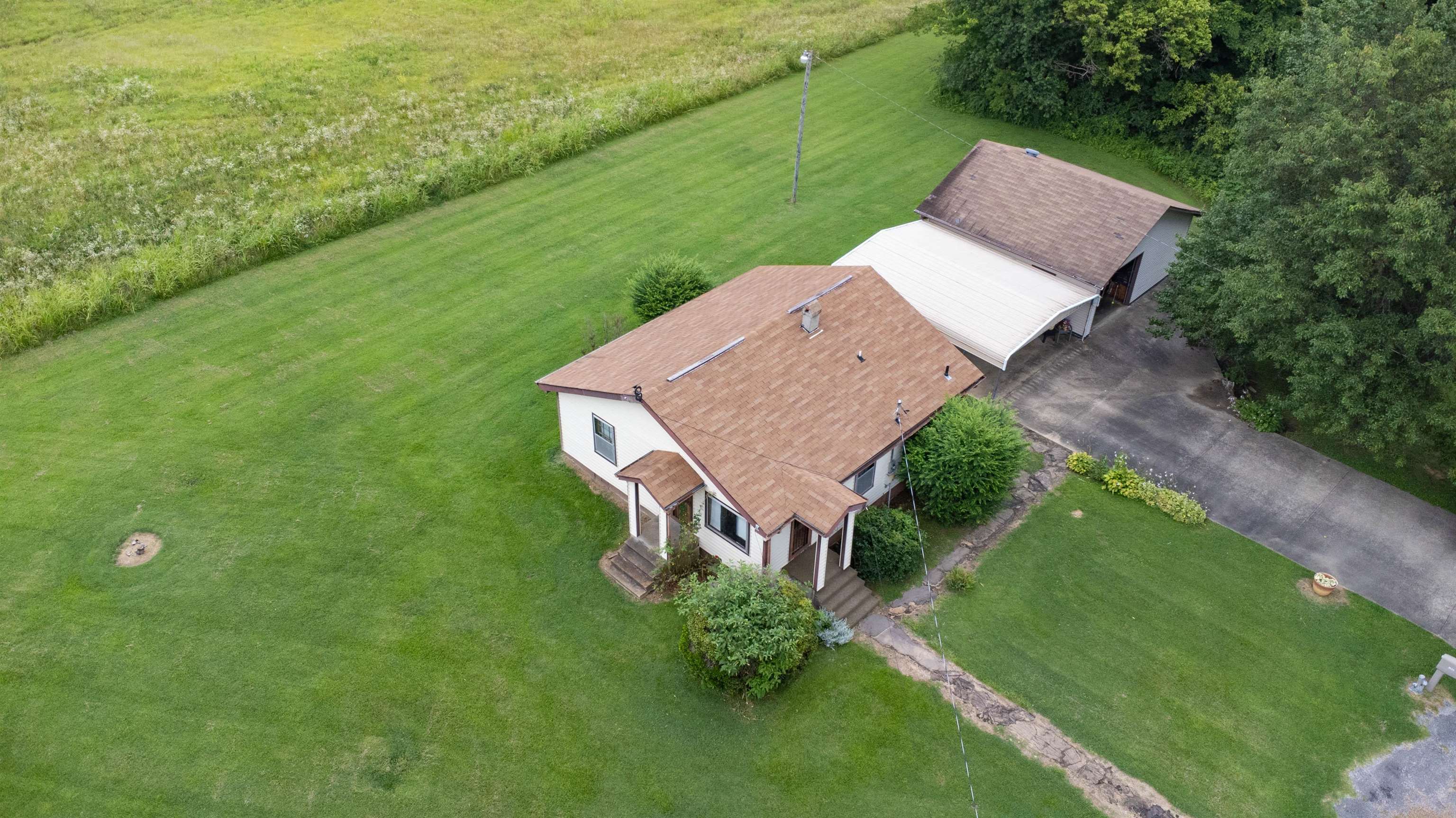 2250 Chisholm Lake Road Ripley, TN 38063 - Photo 5 of 32 an aerial view of a house