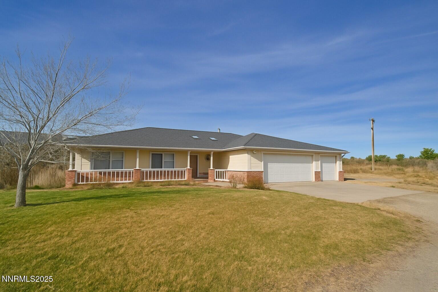 1905 Lakeshore Drive Washoe Valley, NV 89704 - Photo 1 of 31 a front view of a house with a yard