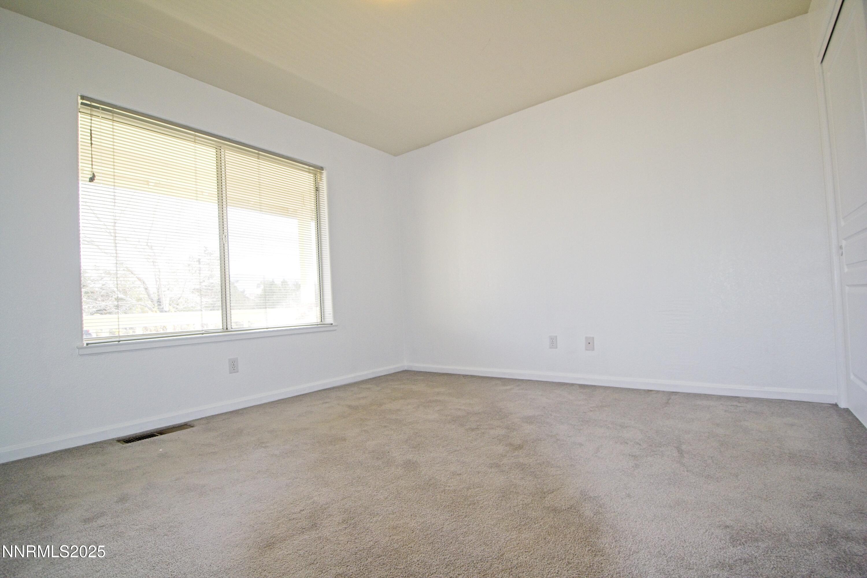 1905 Lakeshore Drive Washoe Valley, NV 89704 - Photo 14 of 31 an empty room with a window