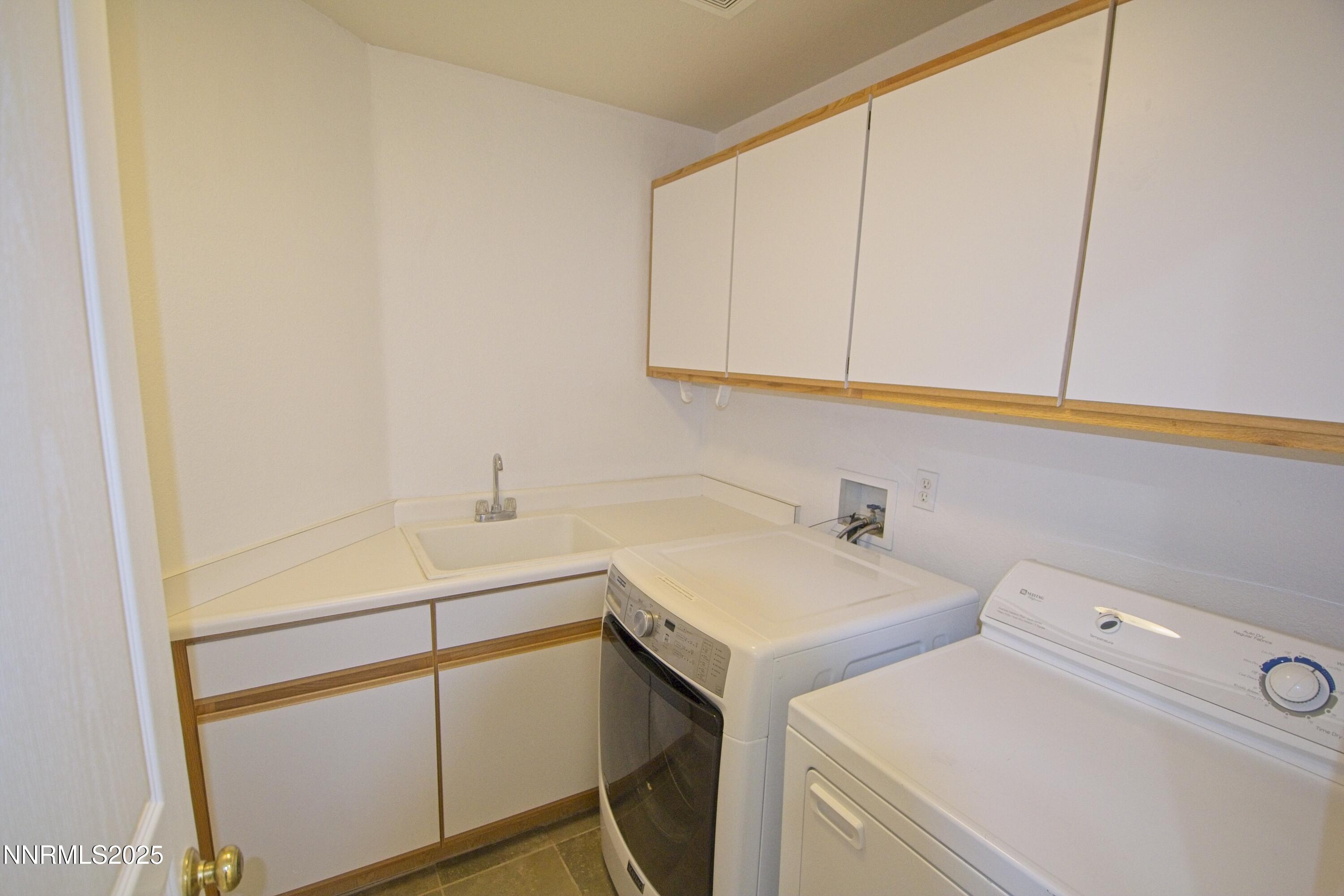 1905 Lakeshore Drive Washoe Valley, NV 89704 - Photo 20 of 31 a utility room with dryer and washer