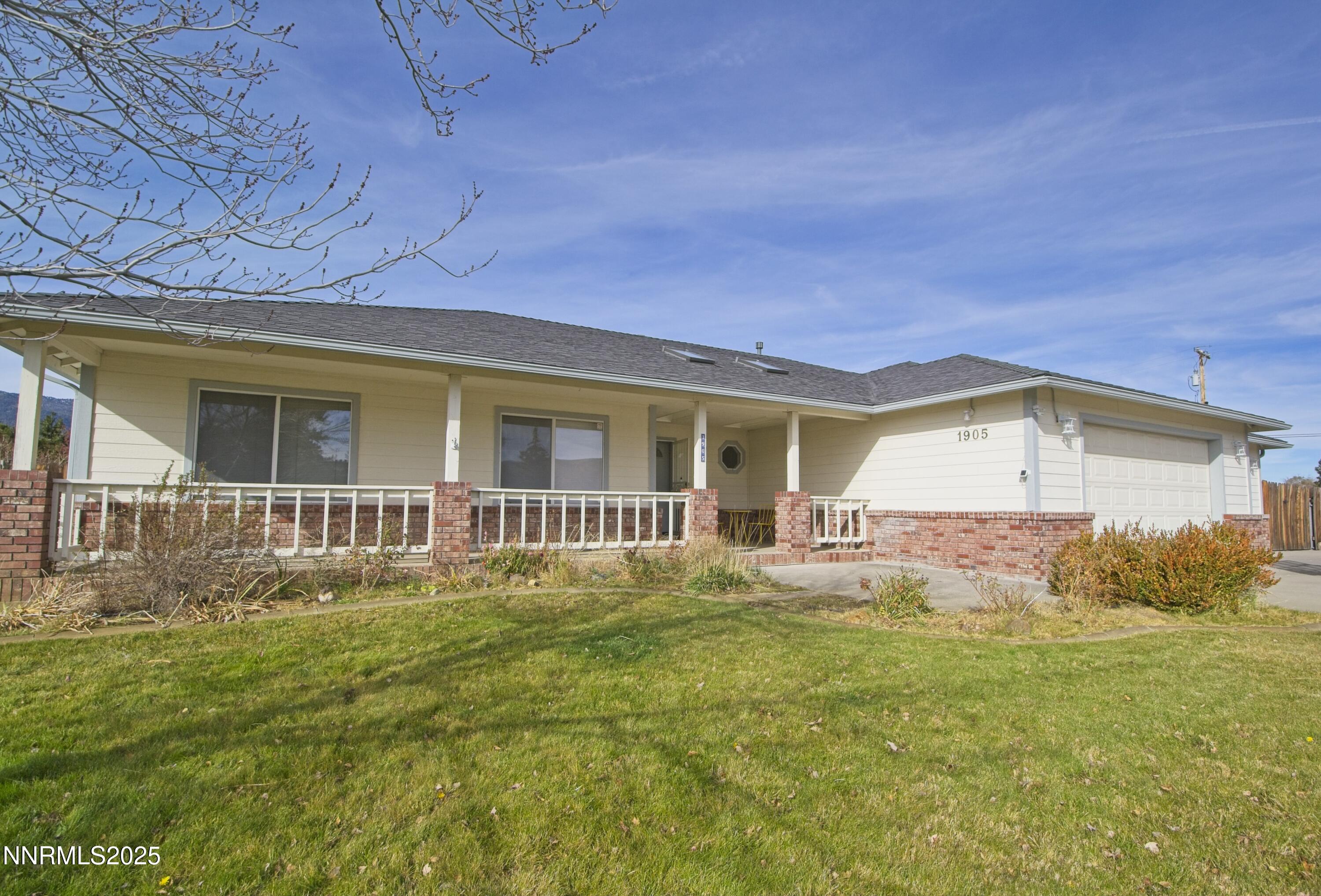 1905 Lakeshore Drive Washoe Valley, NV 89704 - Photo 30 of 31 a front view of a house with garden