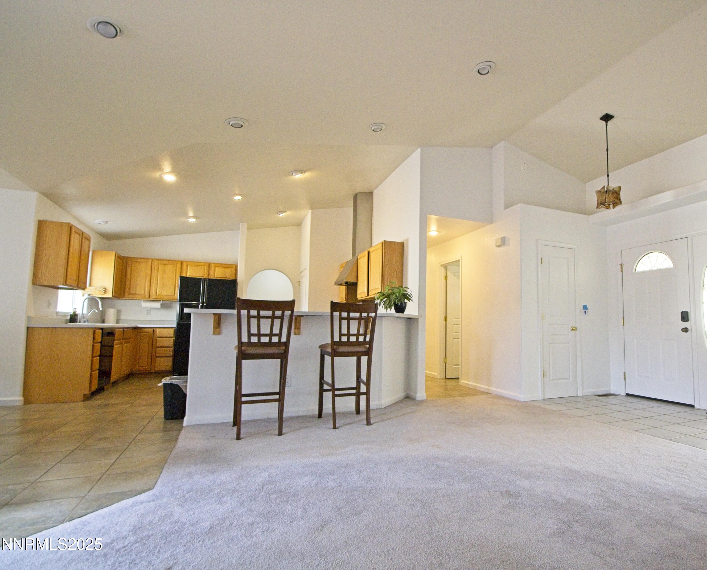 1905 Lakeshore Drive Washoe Valley, NV 89704 - Photo 8 of 31 a view of a livingroom with furniture and a kitchen