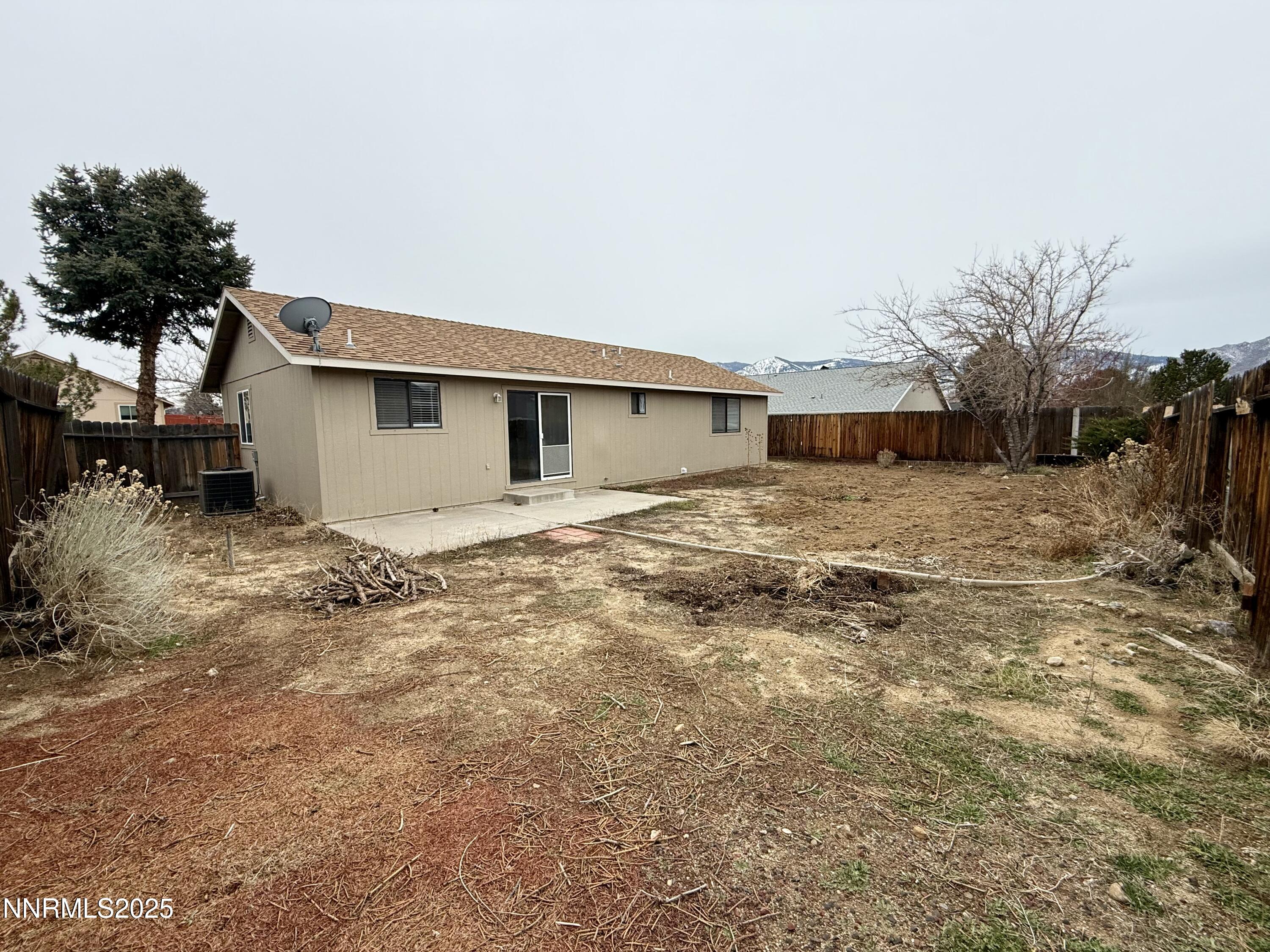 982 Ridgeview Drive Carson City, NV 89705 - Photo 14 of 16 a view of a house with a yard