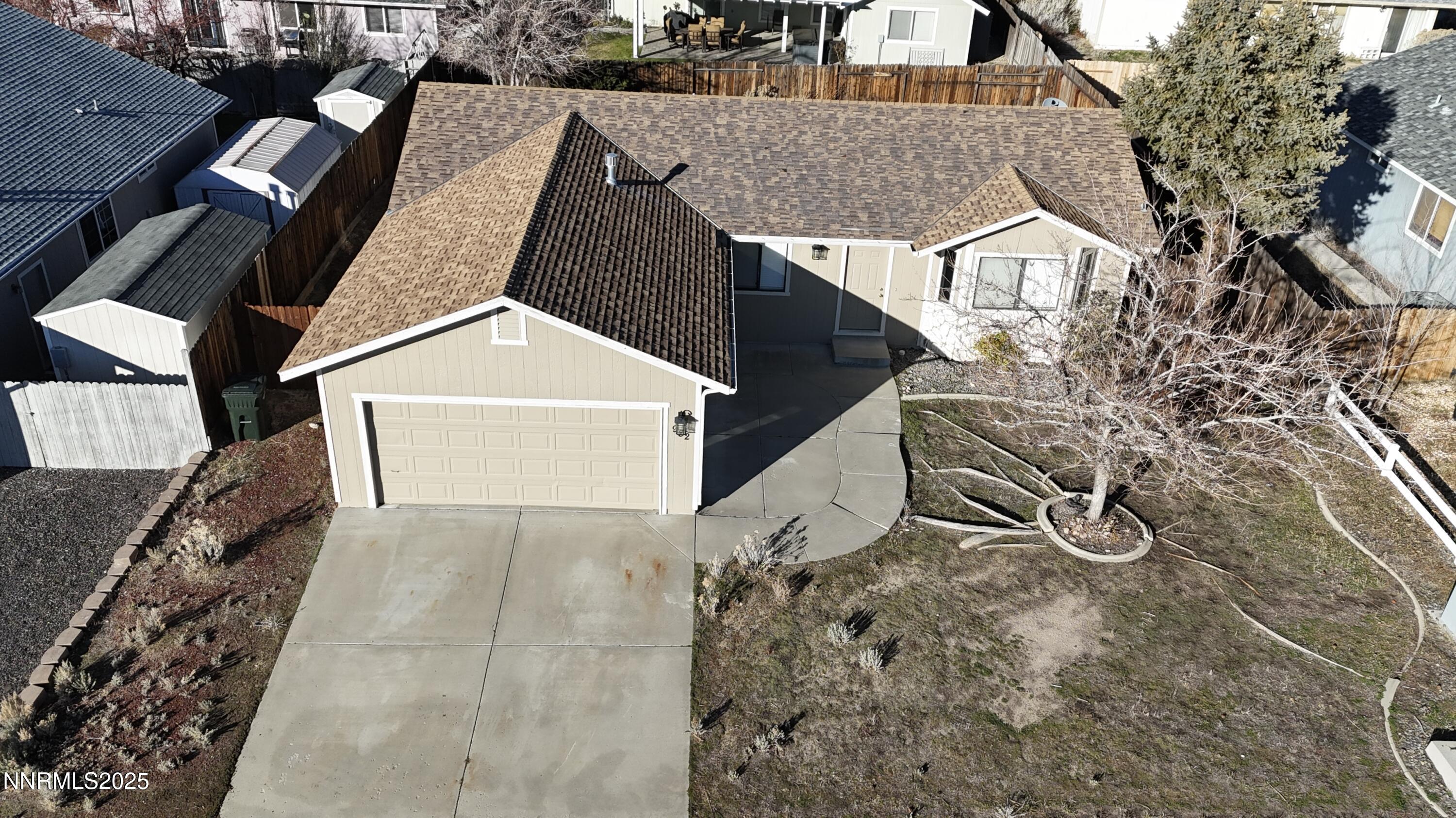 982 Ridgeview Drive Carson City, NV 89705 - Photo 2 of 16 front view of a house with a yard