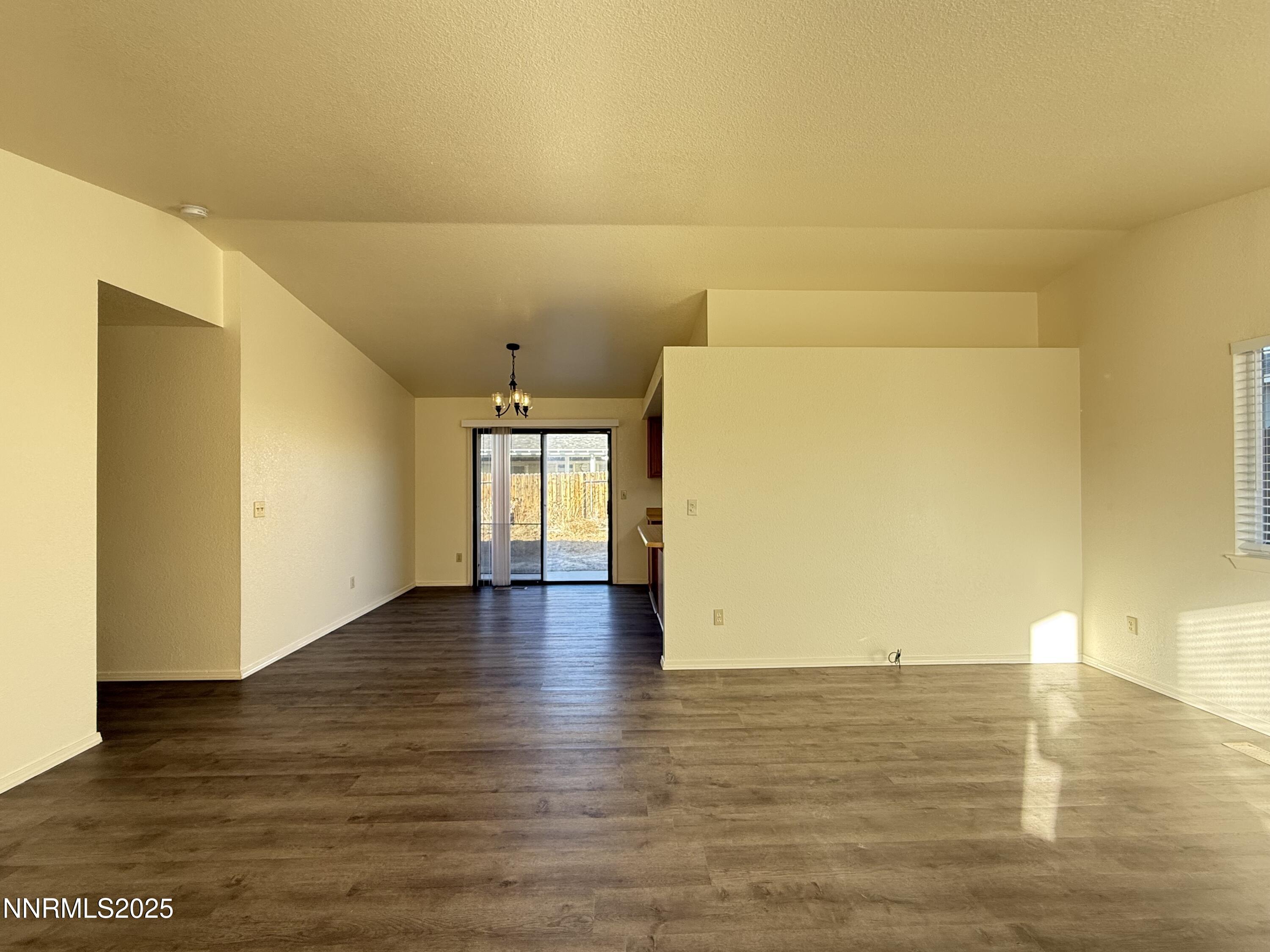 982 Ridgeview Drive Carson City, NV 89705 - Photo 4 of 16 a view of a room with wooden floor