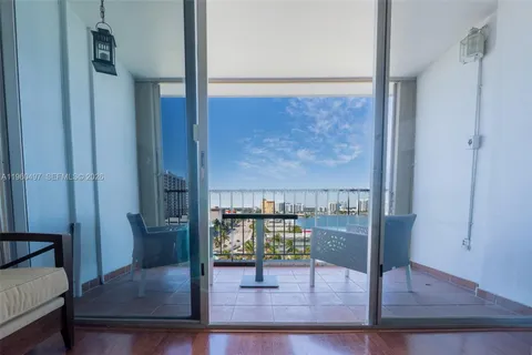 a view of entryway dining room and hall with wooden floor