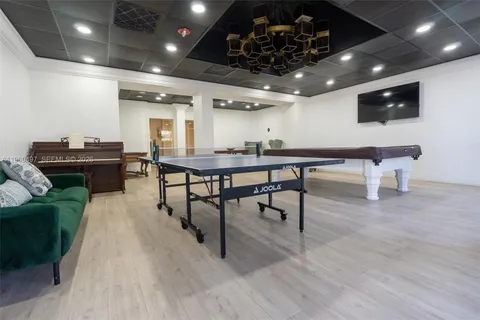 a view of a workspace with furniture