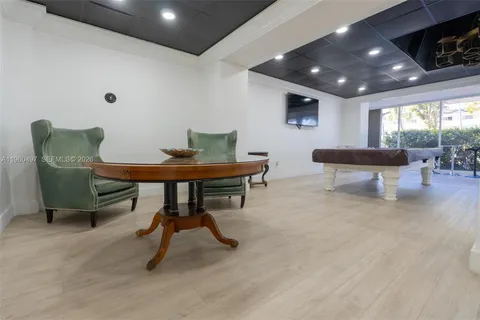 a view of a livingroom with furniture