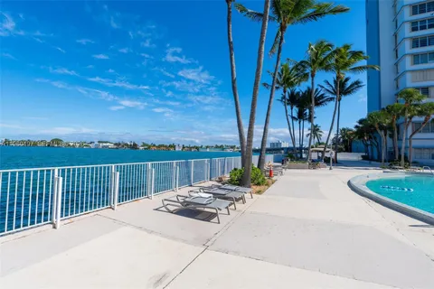 a view of a park with swings and slides