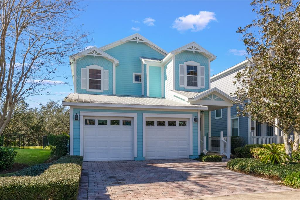 1423 Fairview Circle Reunion, FL 34747 - Photo 1 of 1 Light and bright Reunion charmer close to the Parks with a METAL ROOF, CONSERVATION VIEWS, DUAL PRIMARY SUITES, new floors, fresh paint and the astounding Reunion Resort amenities!