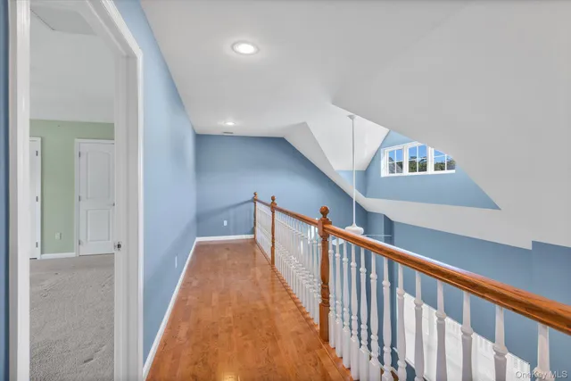 a view of a hallway with entryway