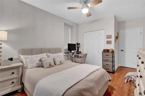 a bedroom with a bed and furniture