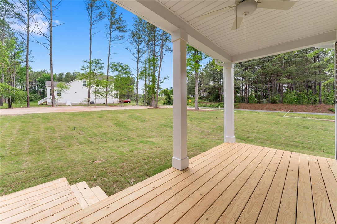 110 Lakeside Drive Anderson, SC 29621 - Photo 33 of 34 Relax on the porch and enjoy views of the expansive yard surrounded by mature trees.