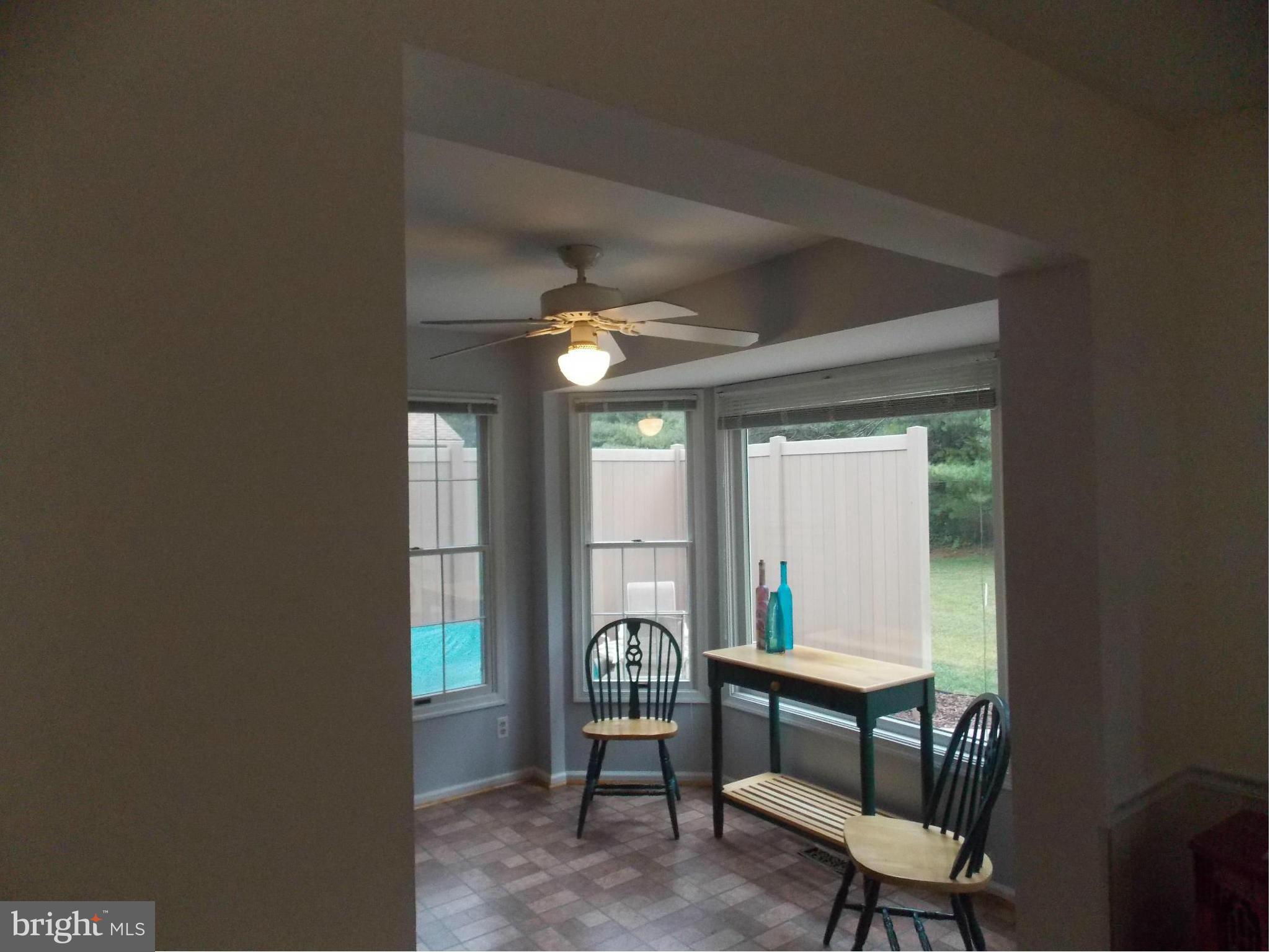306 Pytchley Run Annapolis, MD 21403 - Photo 14 of 24 a balcony with table and chairs