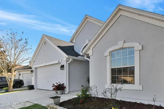 a view of house with street