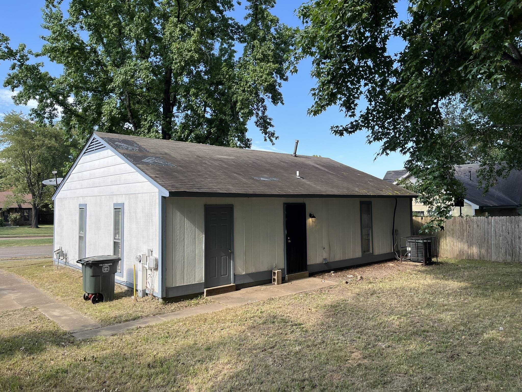 3273 Ridgemont Avenue Memphis, TN 38128 - Photo 2 of 16 a view of a house with a yard