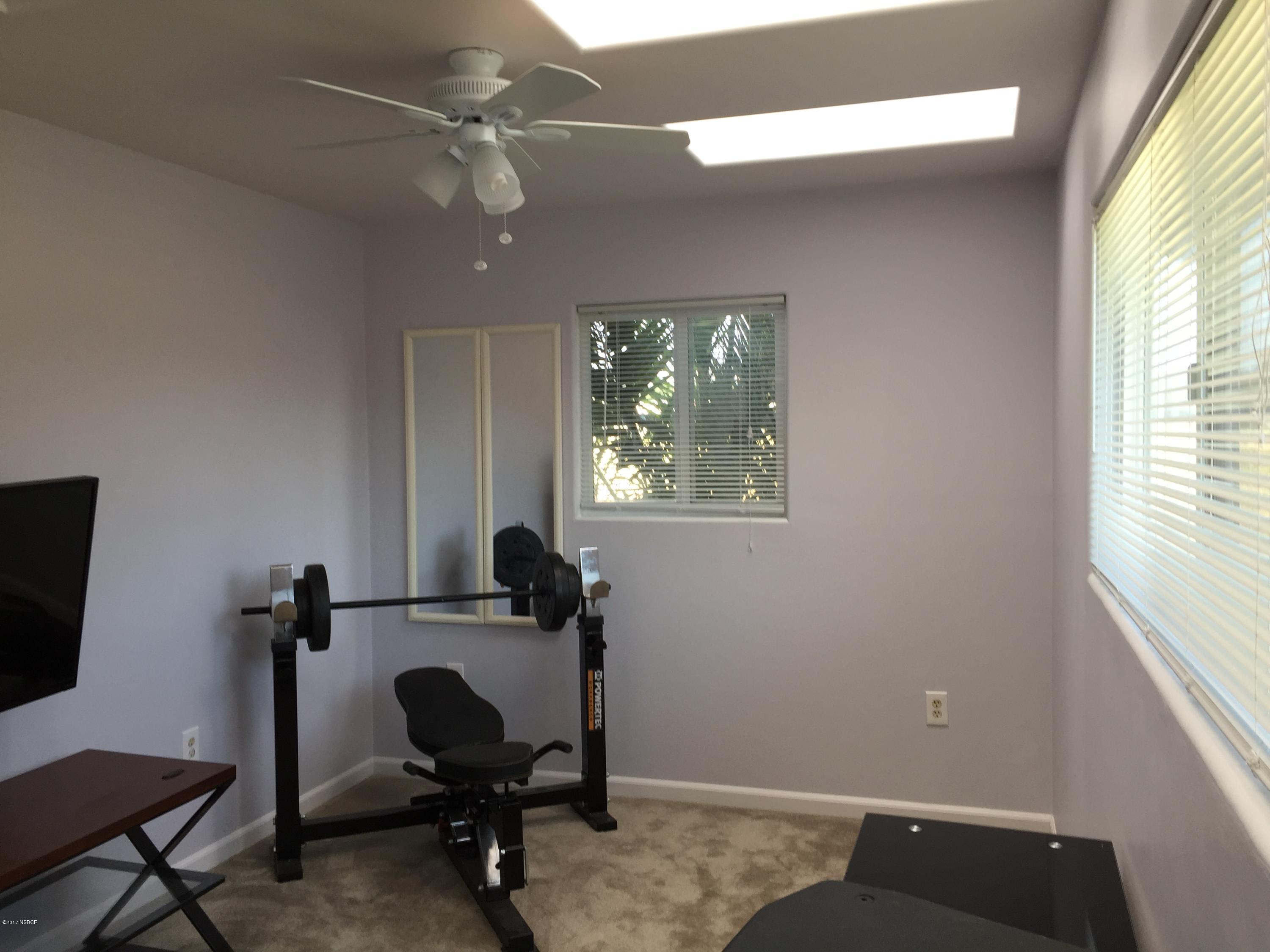 4035 Rigel Avenue Lompoc, CA 93436 - Photo 31 of 35 a view of a workspace with furniture and a window