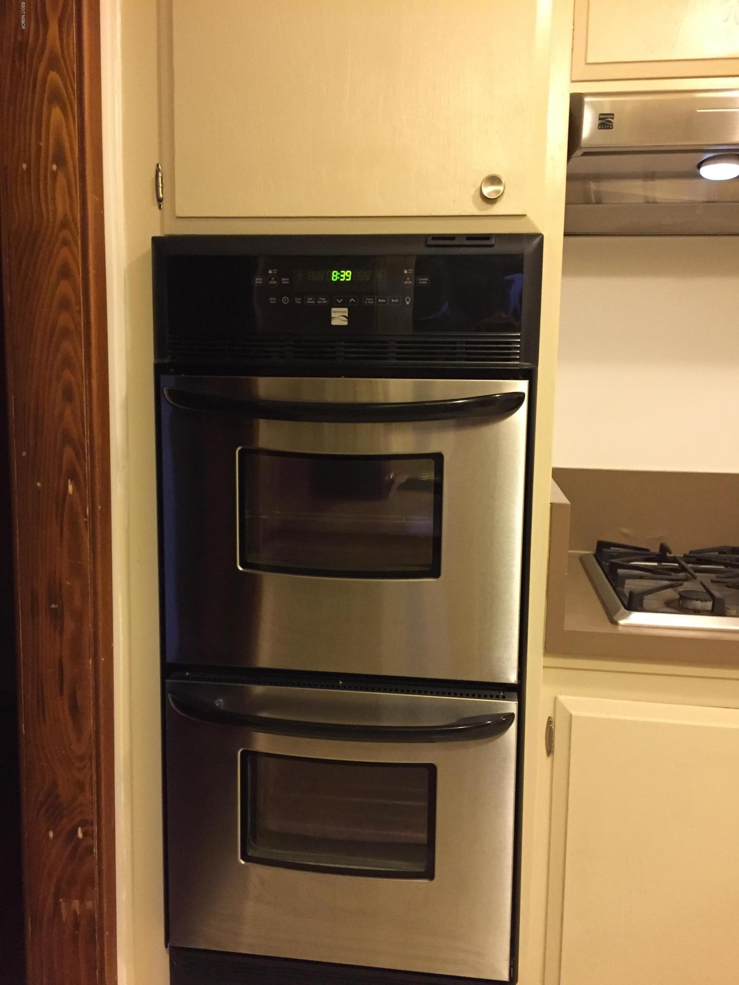 4035 Rigel Avenue Lompoc, CA 93436 - Photo 8 of 35 a stove top oven sitting inside of a kitchen
